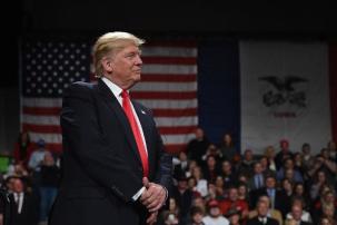 President-Elect Donald Trump looks on in Des Moines, Iowa on Dec. 8, 2016 during the USA Thank You Tour 2016 at the Hy-Vee Hall in the Iowa Events Center. 